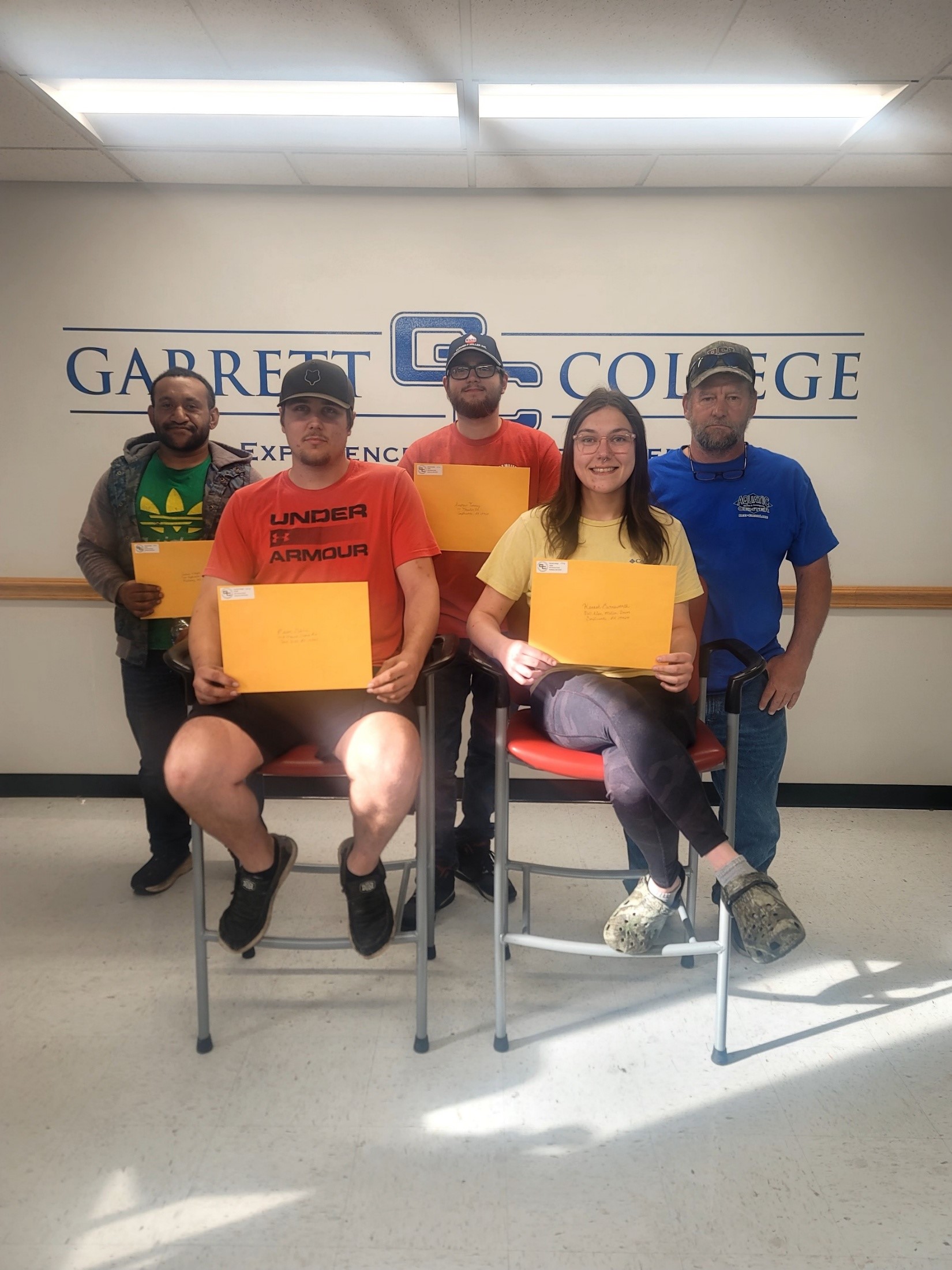 Five students earn college certificates as marine technicians marine technicians